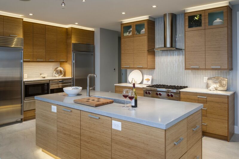 A kitchen featuring non-toxic bamboo cabinets, demonstrating the modern, sleek appeal of eco-friendly materials