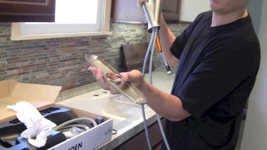 Contractor following step-by-step instructions to install an ADA-compliant faucet at the correct depth