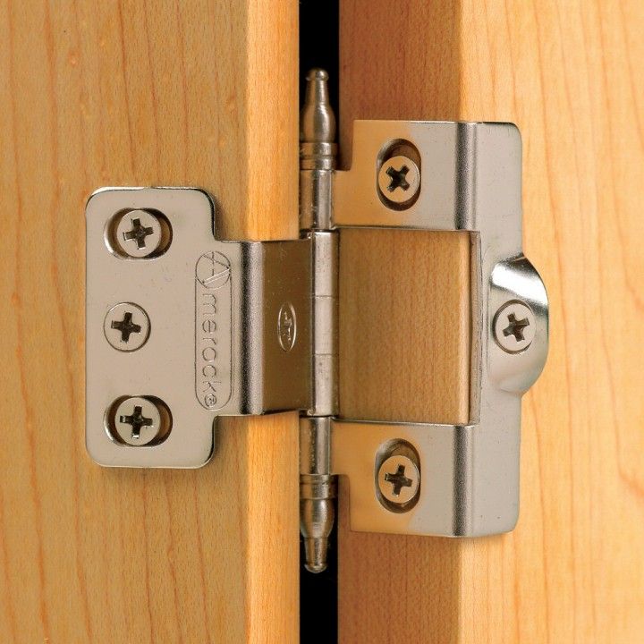 Inset hinges, showing how the door sits flush with the frame for a seamless look