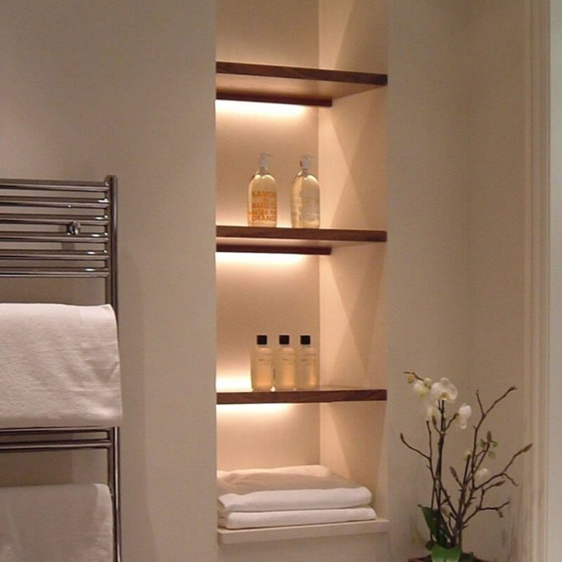 Bathroom cabinet with open shelves featuring adjustable backlighting for added elegance and functionality