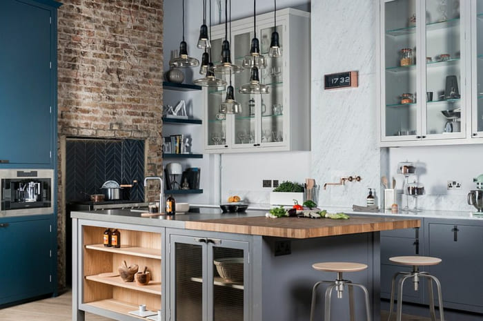 Industrial style kitchen island with mixed materials