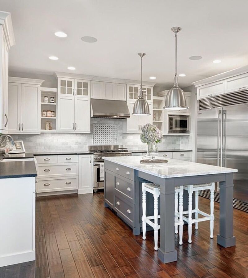 Innovative kitchen island base cabinet with concealed drawers and appliance storage for an organized space