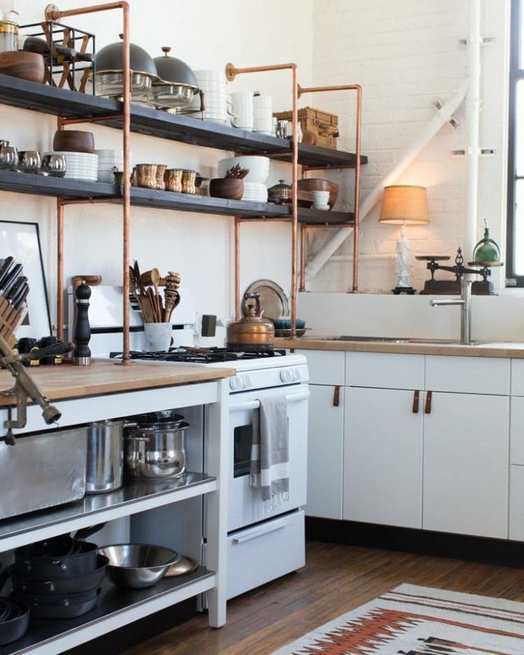 Kitchen with open shelves combining wood and steel materials for an industrial aesthetic