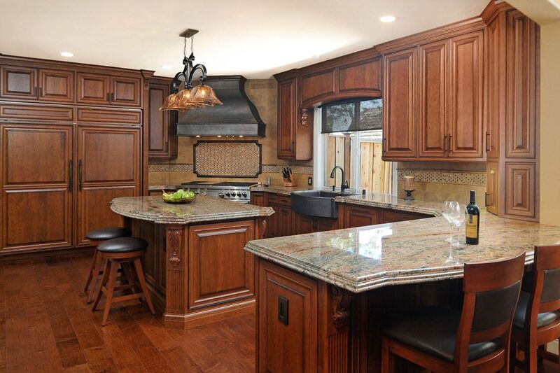 Medium-stained cherry cabinets in a transitional kitchen