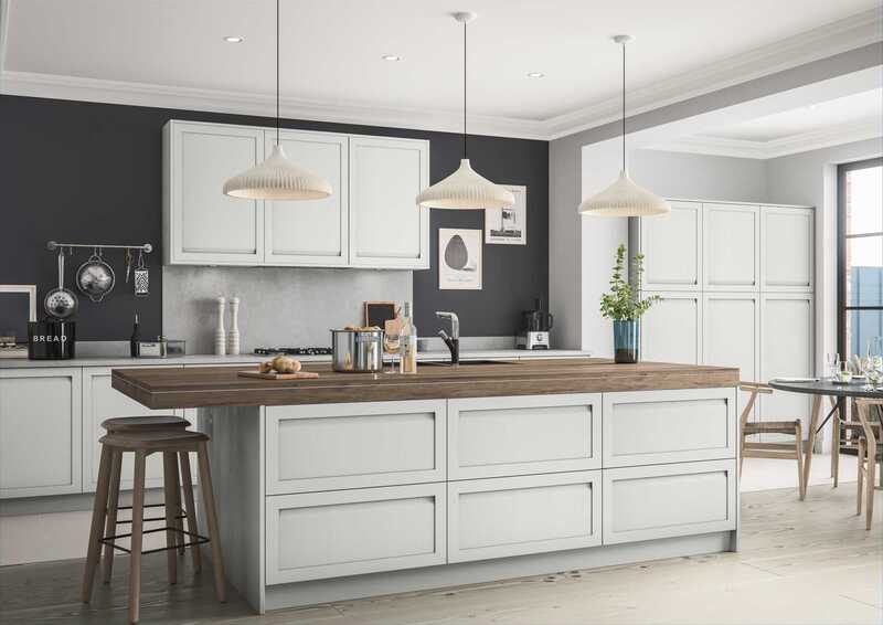 Modern kitchen featuring a shaker-style kitchen island with optimized height