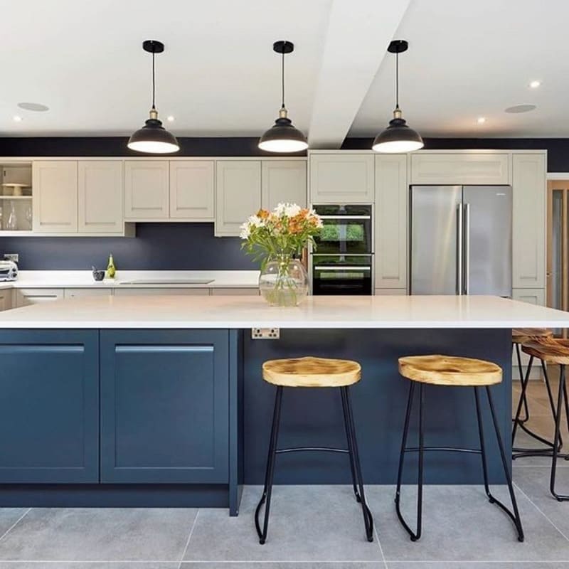 Mixed Color Kitchen Cabinets: Modern kitchen featuring mixed color cabinets with navy lowers and white uppers