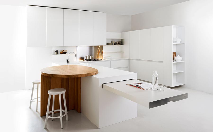 Space-saving kitchen island with a slim profile and extendable countertop for compact spaces