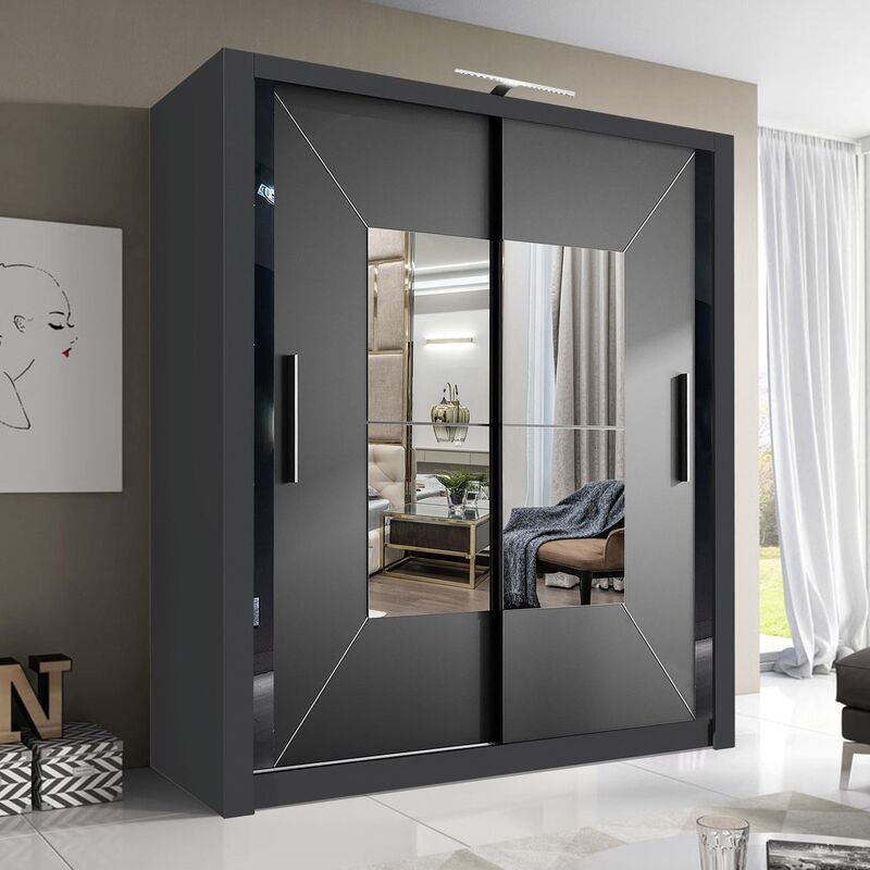 A bedroom wardrobe with black pulls