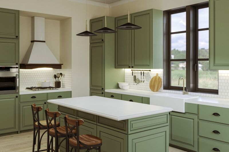 A kitchen with sage green cabinets and white marble countertops for a balanced and calming aesthetic