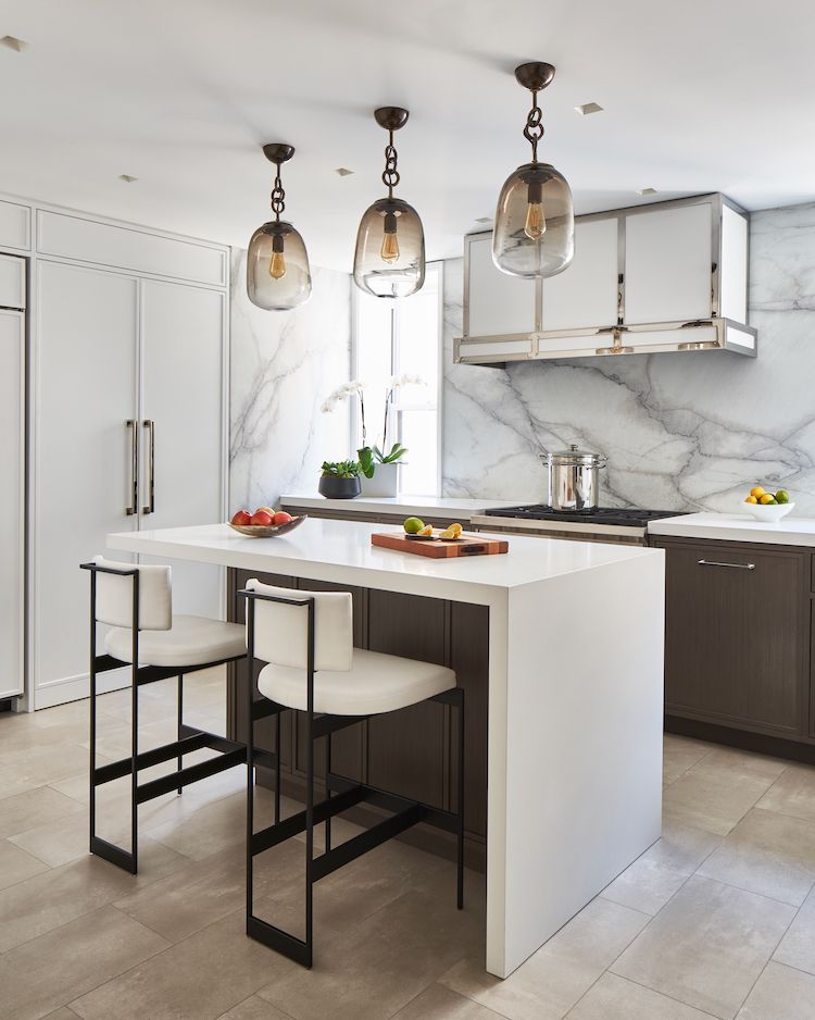 Modern kitchen showcasing a small kitchen island with perfect clearance