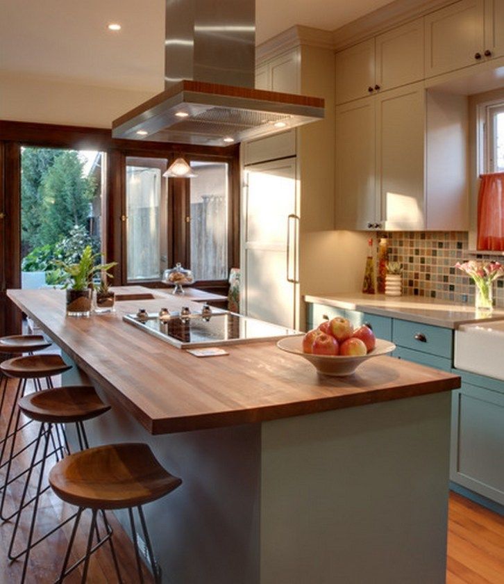 Multifunctional kitchen island with integrated stovetop and seating for four