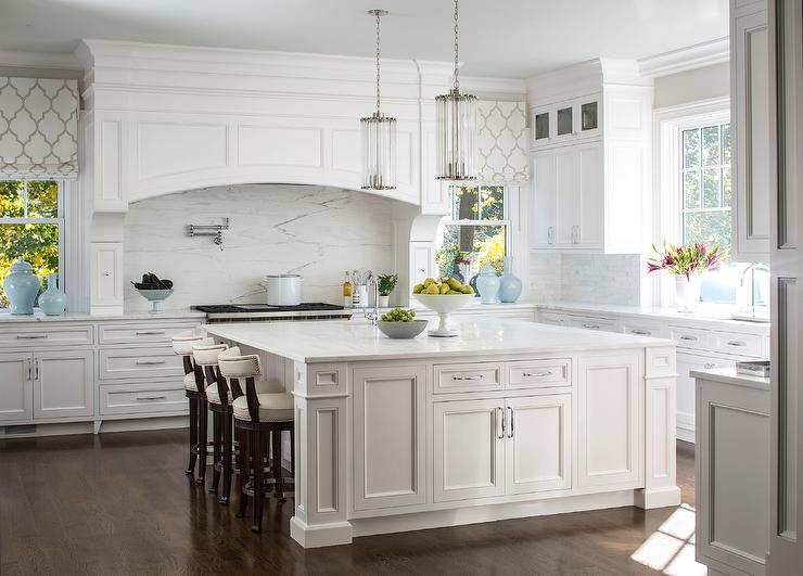 Oversized kitchen island with generous countertop space and built-in storage solutions