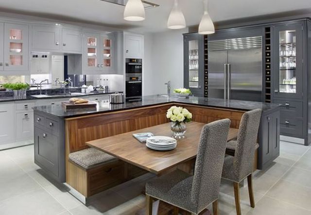 Kitchen island designed for dining and prep, complete with integrated seating and storage