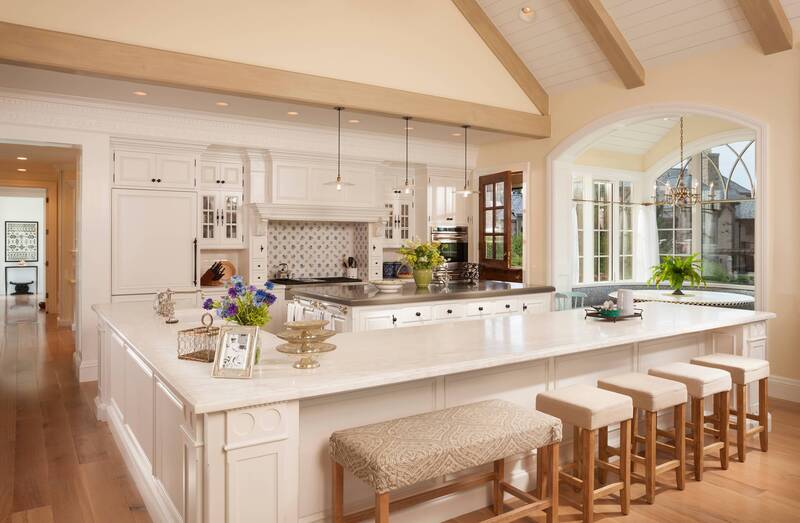 A sleek and modern L shaped kitchen with island