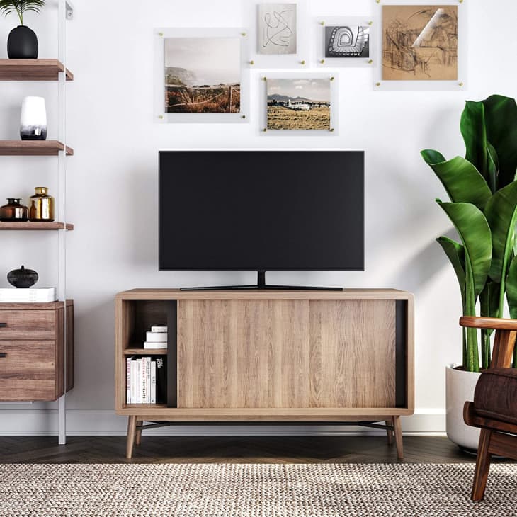 A custom-designed media cabinet for a compact apartment