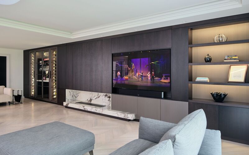 A custom-designed media wall cabinet