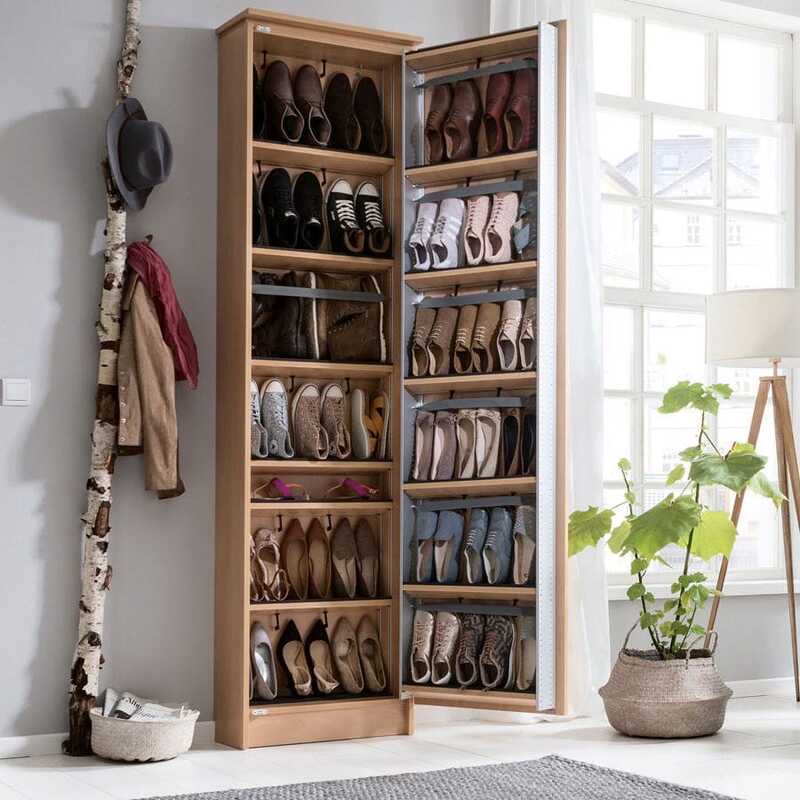 A custom-built shoe cabinet with deep compartments and adjustable shelving