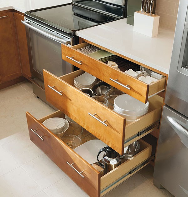 A modern kitchen featuring customized 3 drawer kitchen base cabinets, built for durability and functionality