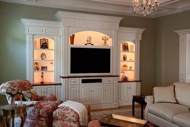 A contemporary tall media cabinet, combining elegant design with functional storage in a modern living room