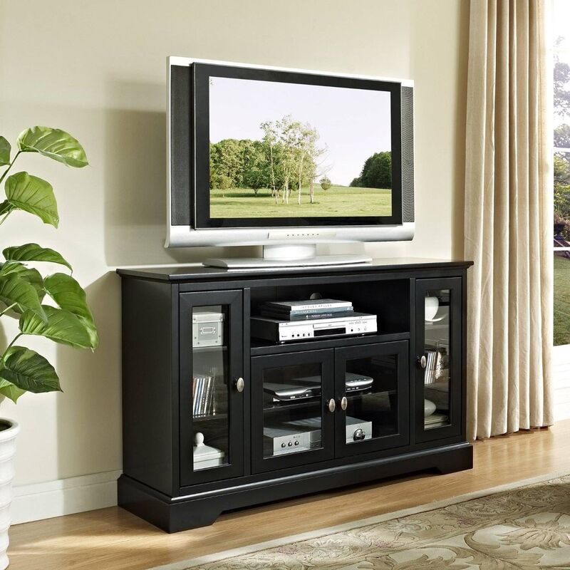 A modern tall media cabinet with a matte black finish, adding sophistication to a contemporary office space