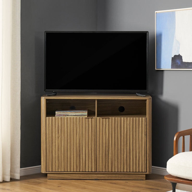 A tall corner media cabinet, providing organized storage and enhancing the aesthetic