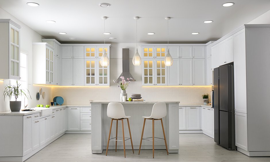 A stylish U shaped kitchen showcasing efficient storage, a well-organized work triangle, and a cohesive modern design