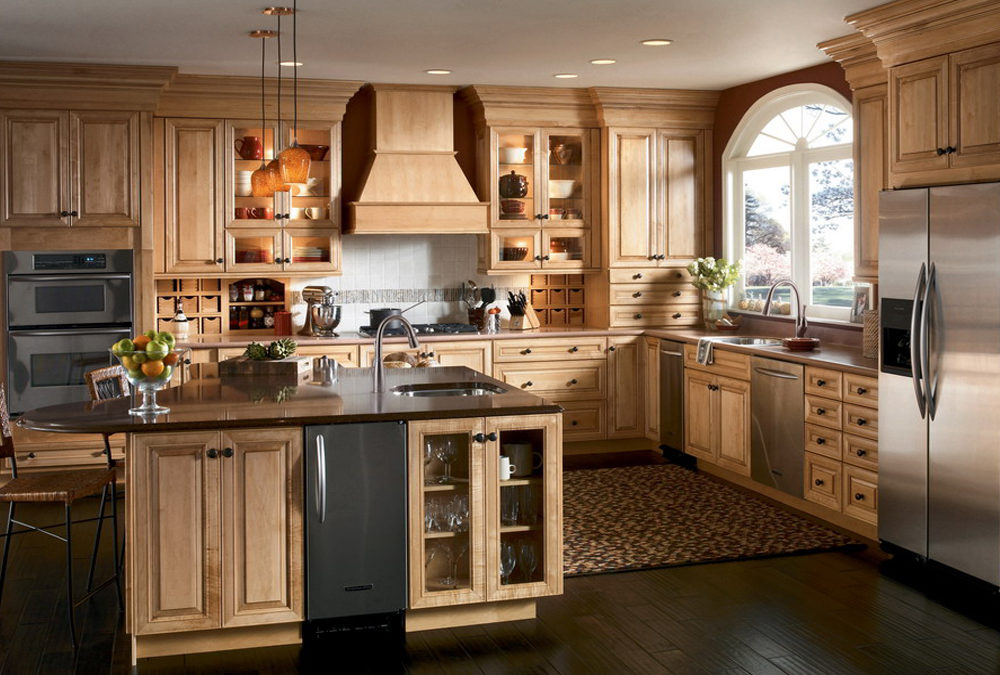 Solid wood kitchen cabinets featuring a natural finish in a warm, rustic kitchen design