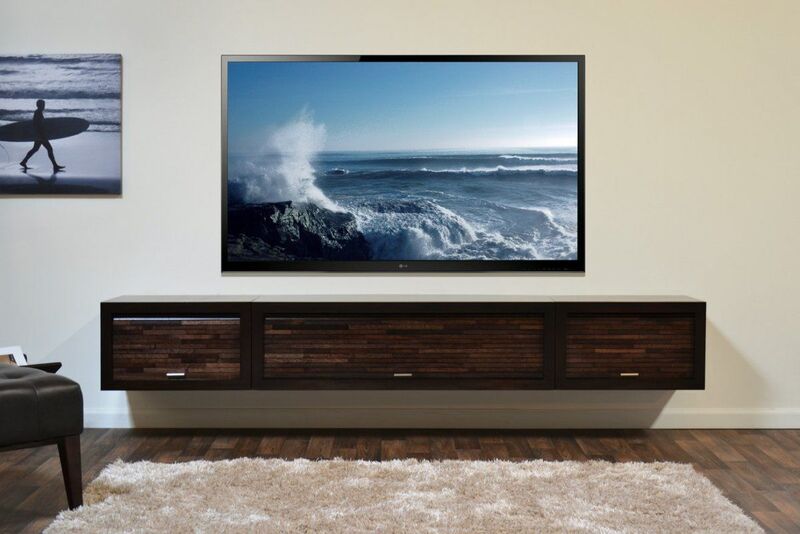 A dark wood media cabinet in a living room setup, emphasizing its popularity in modern homes