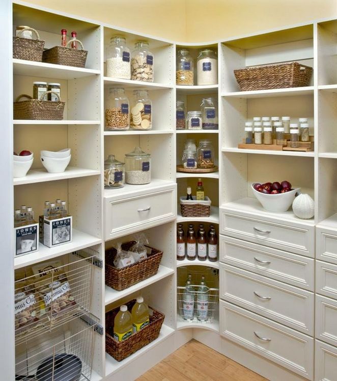 Corner pantry cabinet with rotating lazy Susans and custom shelving, making the most of otherwise unused corner spaces