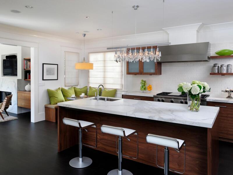 A contemporary kitchen featuring a perfectly placed island with balanced spacing for functionality and visual appeal