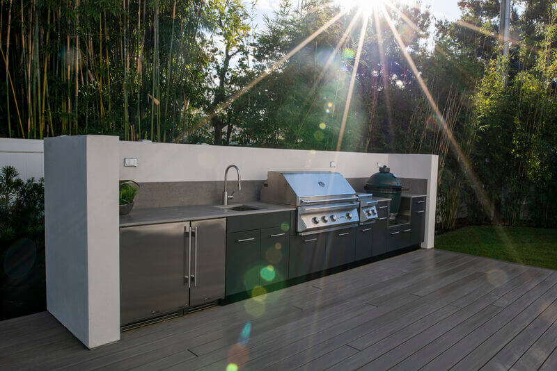 Acrylic finish delivering a sleek and durable touch to outdoor kitchen cabinets