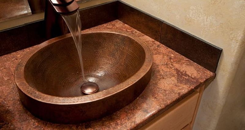 Above-counter sinks are available in a wide variety of materials, including ceramic, glass, stone, and metal.