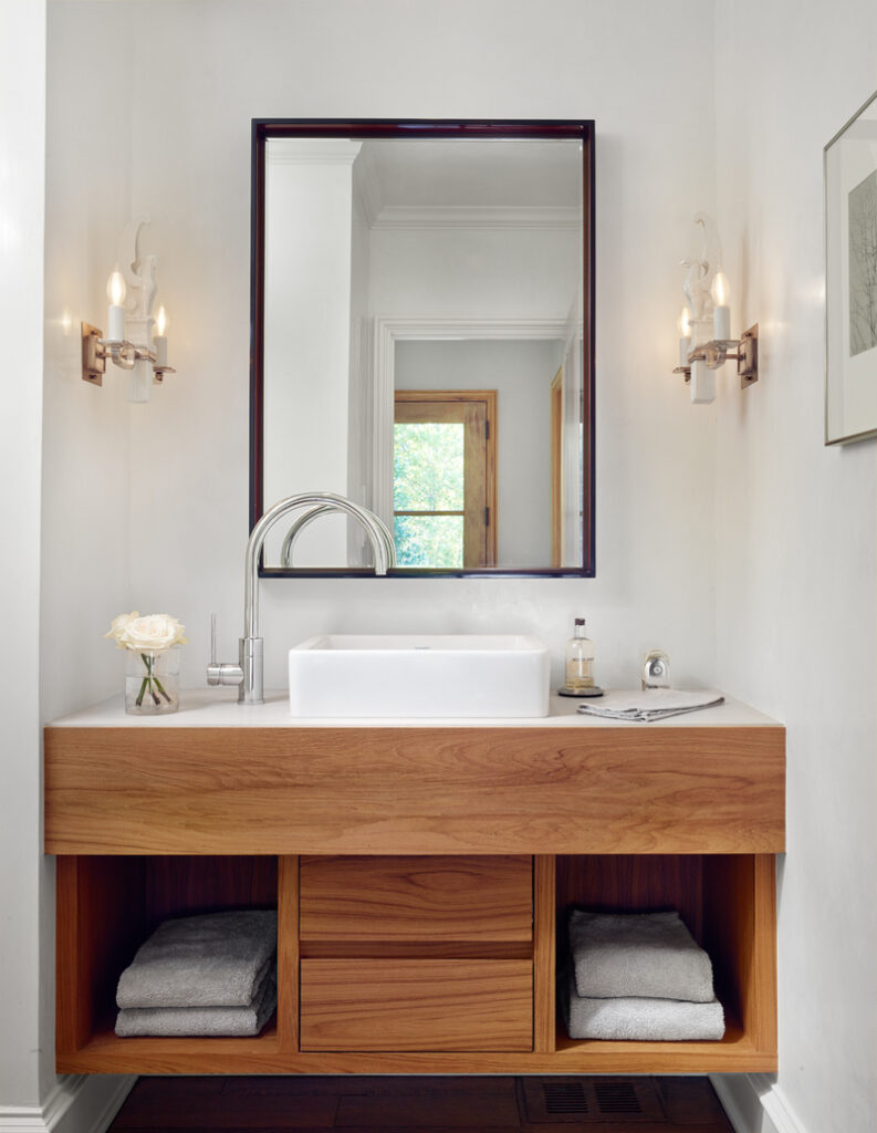 A frameless bathroom vanity cabinet with water-resistant materials