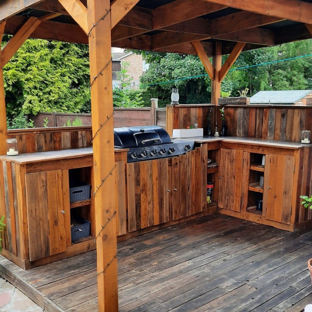 Contemporary outdoor kitchen featuring durable cabinets designed for weather resistance