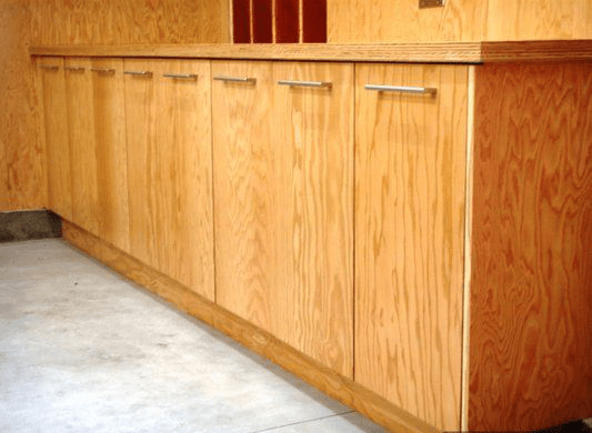 Marine-grade plywood featured in outdoor kitchen cabinets for enhanced moisture resistance and durability