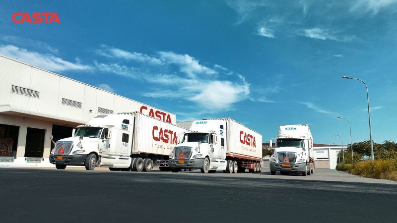 Framed image of a delivery truck loaded with custom frameless cabinets