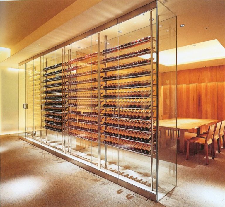 Lockable glass front kitchen cabinets displaying wine bottles