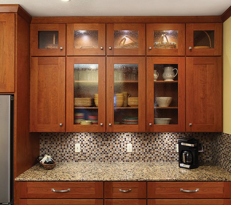 Oak framed glass front cabinet with bronze tint