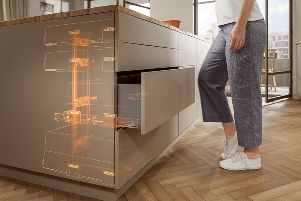 Urban condo kitchen fitted with smart pull-outs and overhead servo lifts