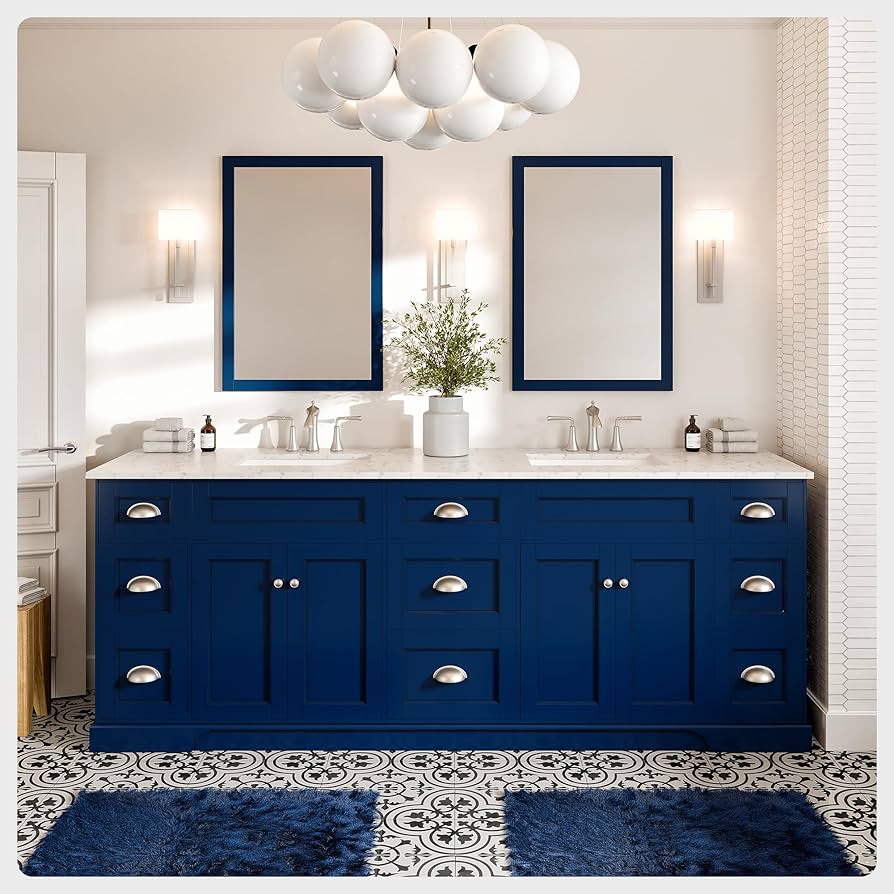 Navy blue bathroom cabinet colors paired with white quartz in a large luxury bathroom
