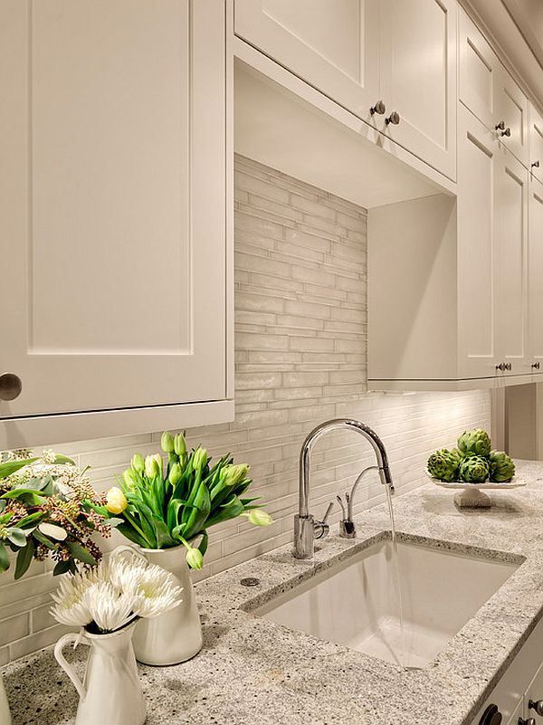 Warm off-white cream kitchen cabinets offering a versatile and resale-friendly color option
