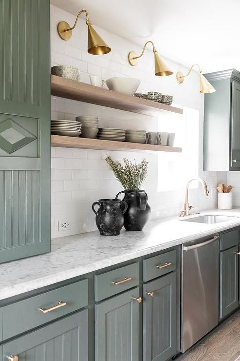 Muted sage kitchen cabinet colors provide boutique-style calm and uniqueness