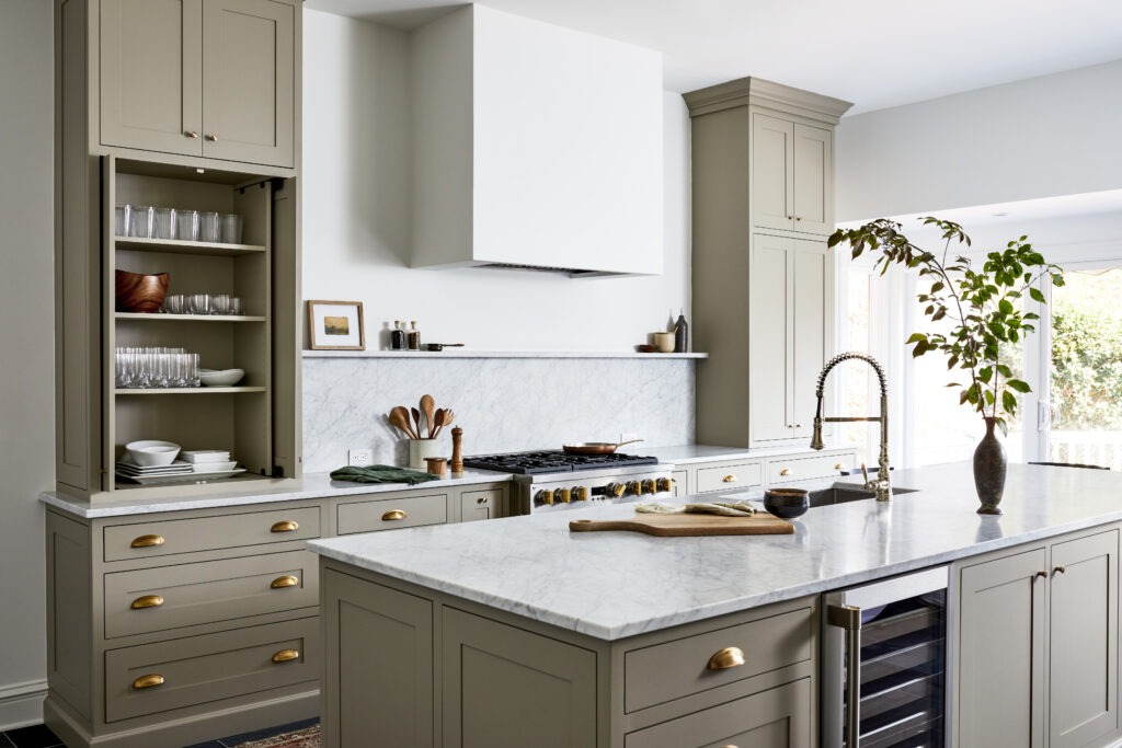 Modern kitchen cabinetry with brushed bronze detailing for luxury appeal