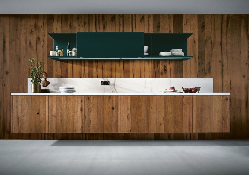 Floating wall-mounted modern kitchen cabinets in minimalist apartment kitchen