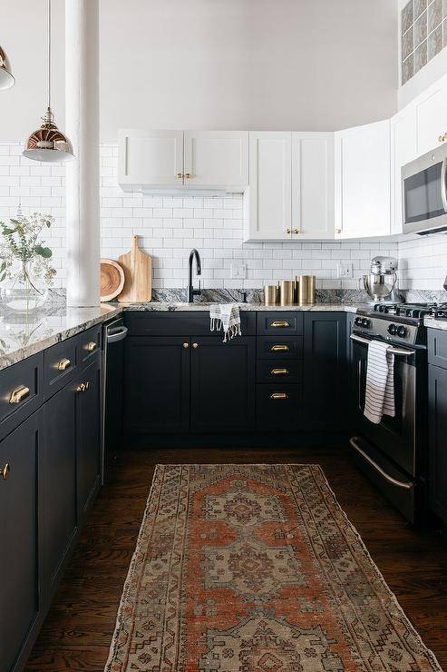 Two-tone black and white kitchen cabinets