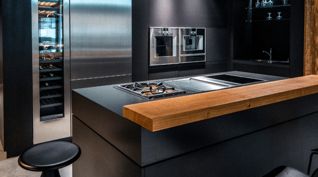 Modern black kitchen cabinets with integrated appliances