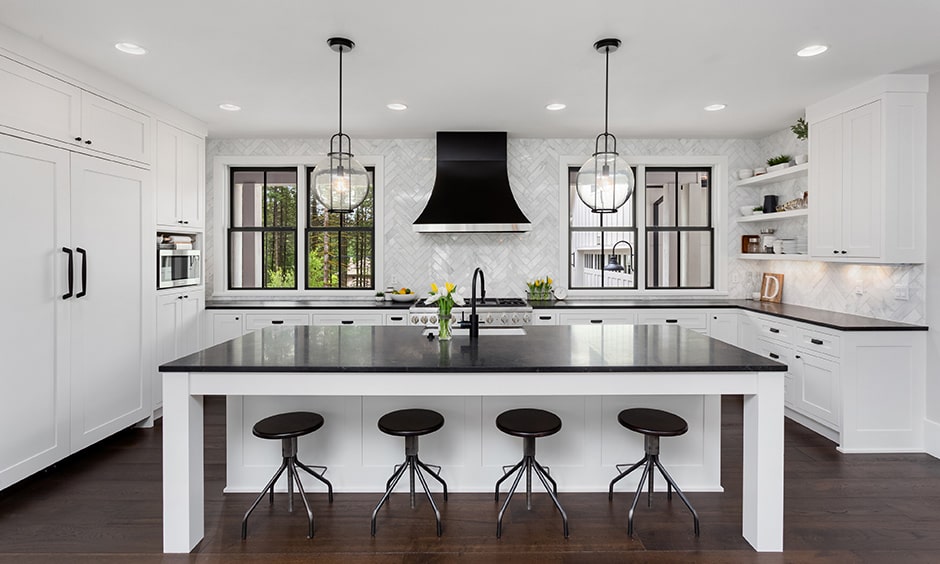 Black and white kitchen cabinets in modern layout
