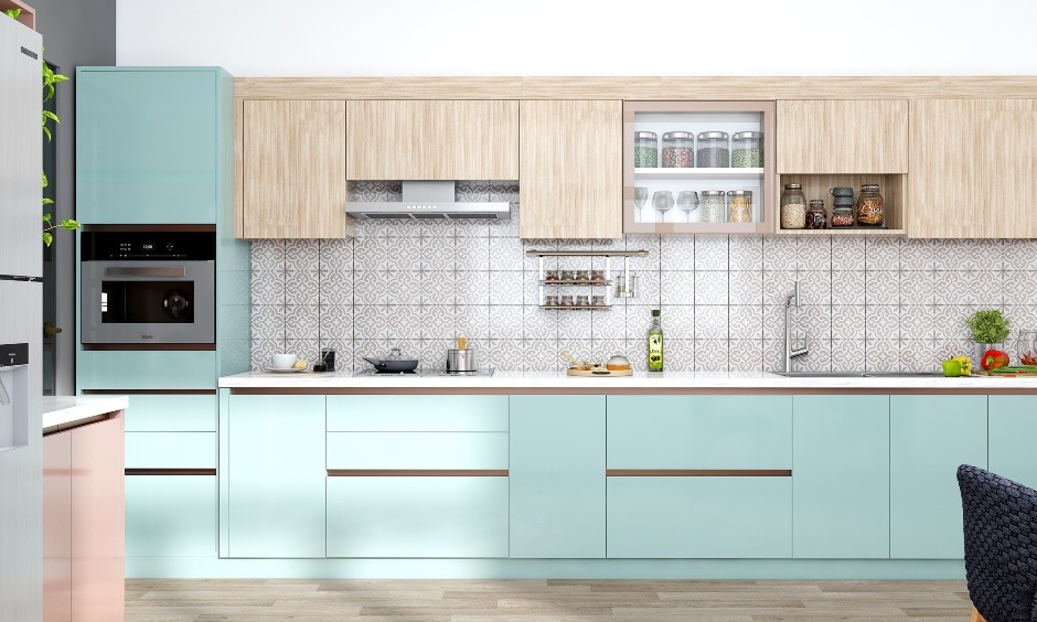 Neutral modular kitchen cabinet colors used consistently across multi-unit apartment developments for durability and uniform appearance