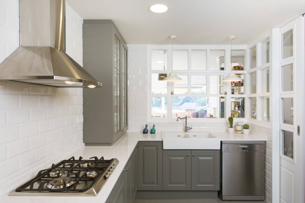 Grey and white kitchen cabinets with industrial touch