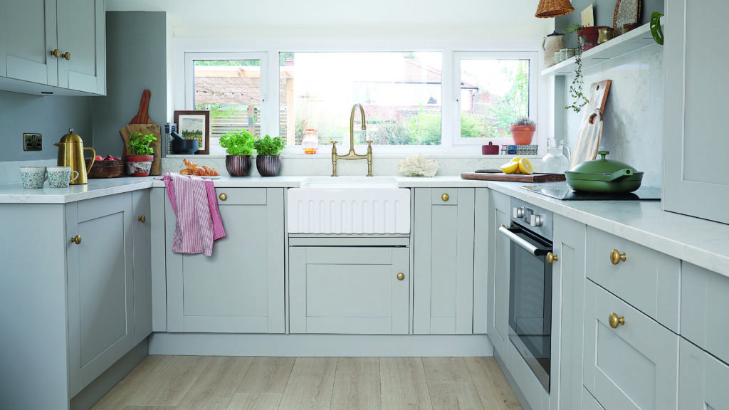 Grey and white kitchen cabinets with soft tones